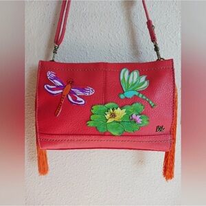The Sak Orange Shoulder Bag with Dragonfly and Floral Design for MAMA